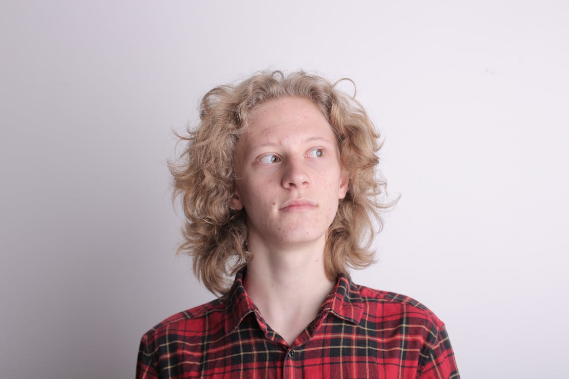 Man in Red and Black Plaid Button Up Shirt