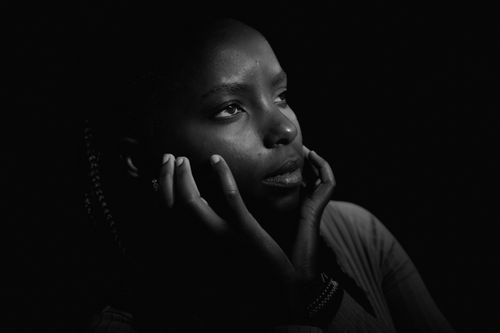Free A captivating black and white portrait of a woman with thoughtful expression. Stock Photo