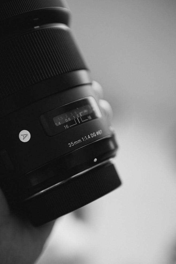 Grayscale Photo Of A Sigma 35mm Camera Lens