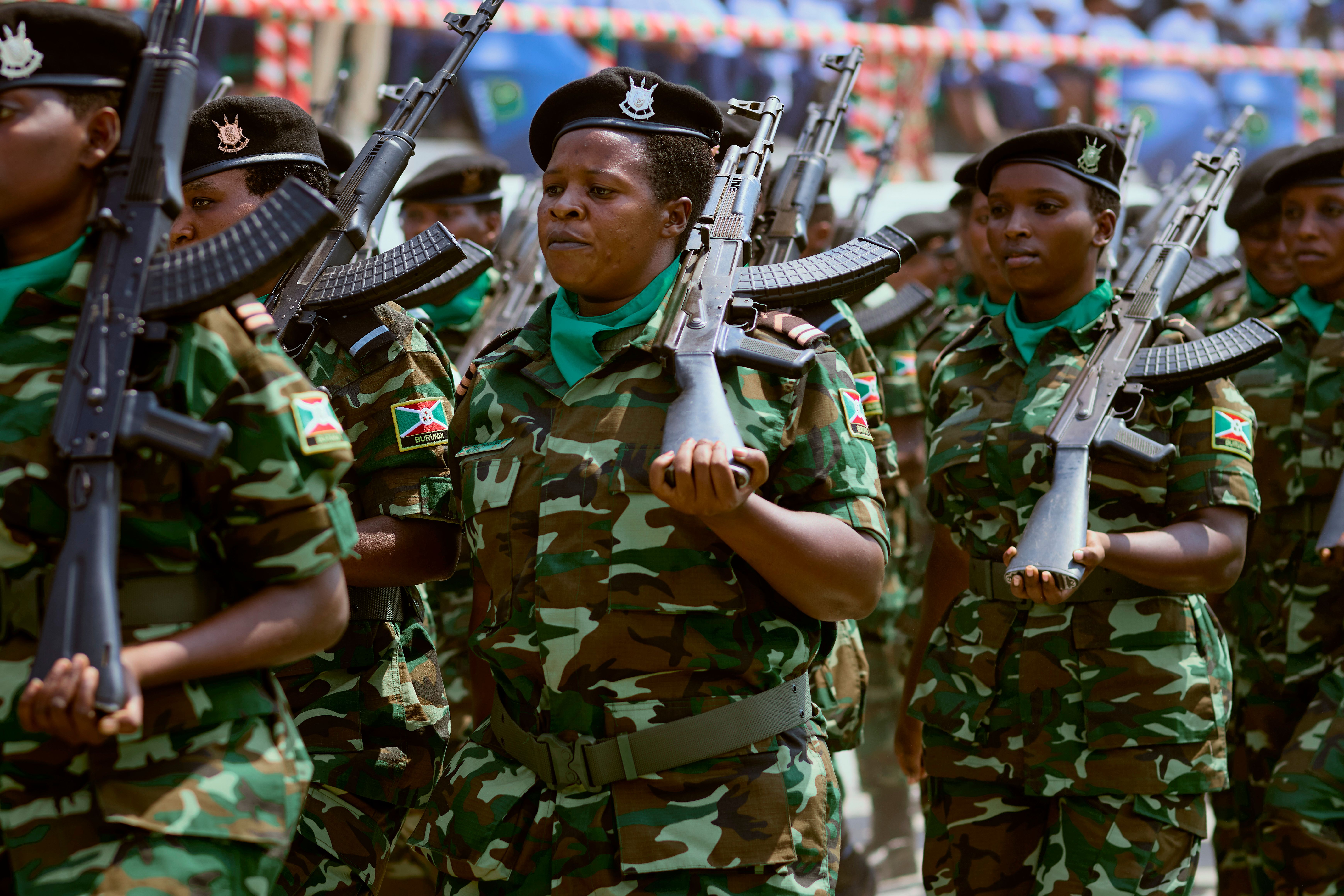 Women soldiers in camouflage uniforms participate in a military parade in Burundi.