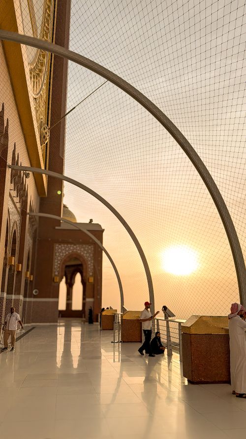 Free Beautiful sunset view from a prominent architectural site with intricate design elements. Stock Photo