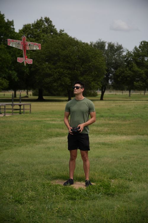 Free Young man controls RC plane in a park in Wichita Falls, Texas, USA. Stock Photo