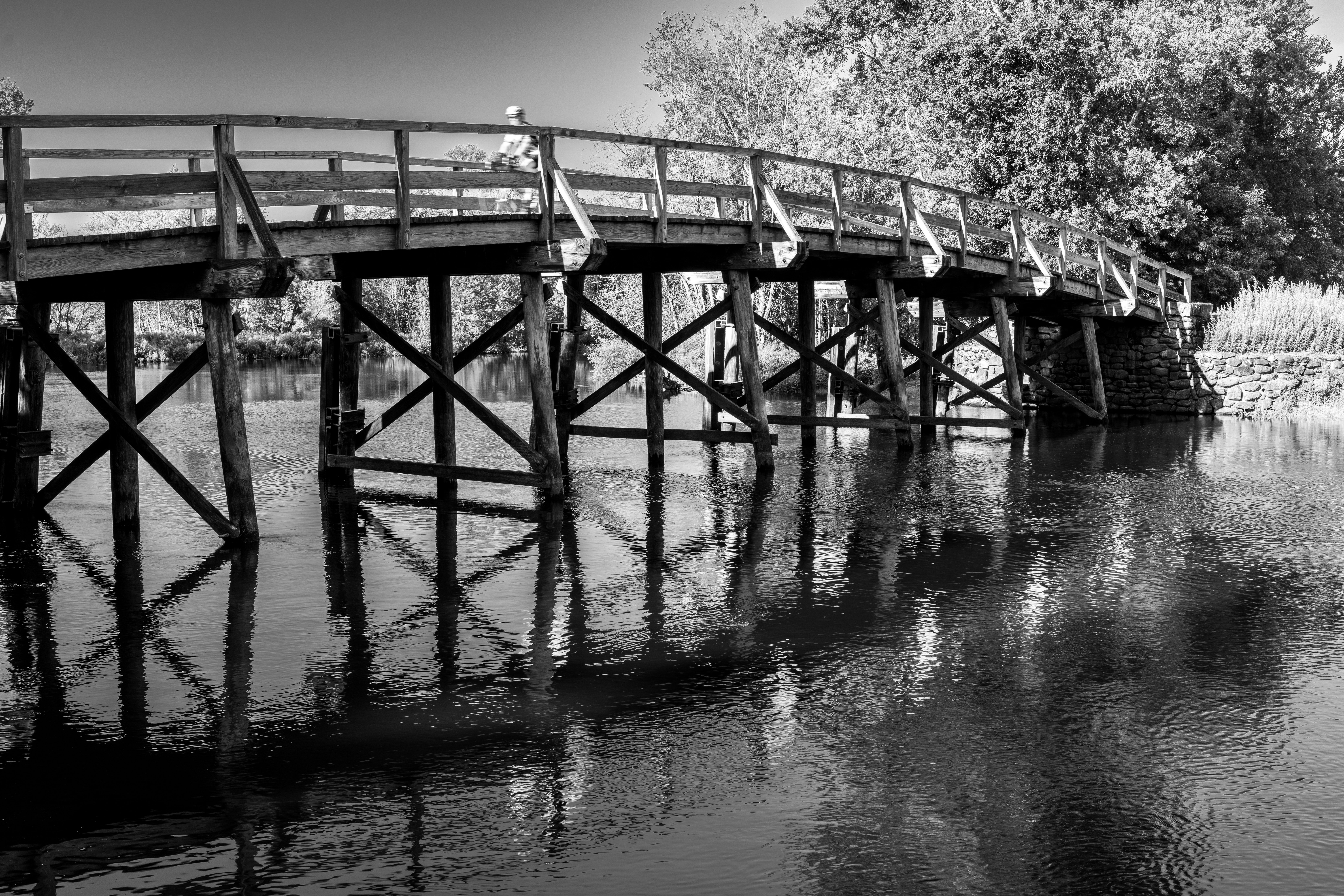 Black and white photo of the iconic Old North Bridge in Concord, Massachusetts.