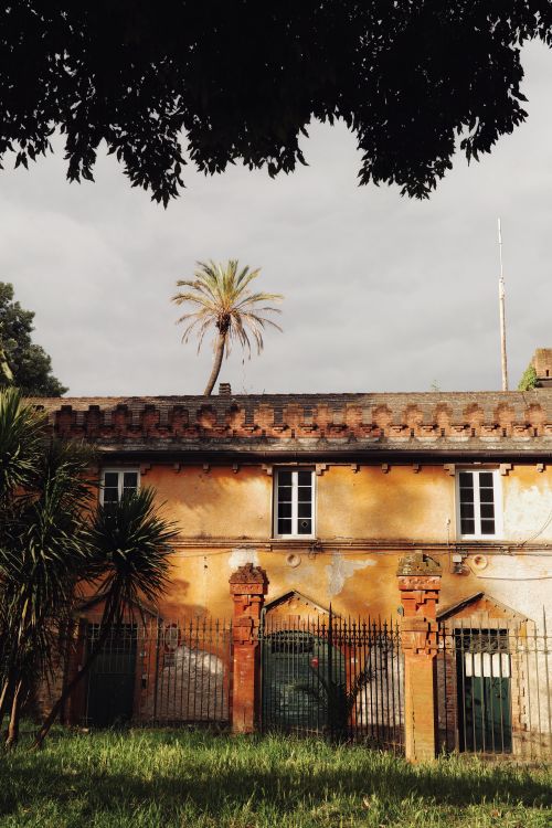 Free Stunning sunlight on a historic mansion in Rapallo, Liguria, Italy. Perfect for architectural enthusiasts. Stock Photo
