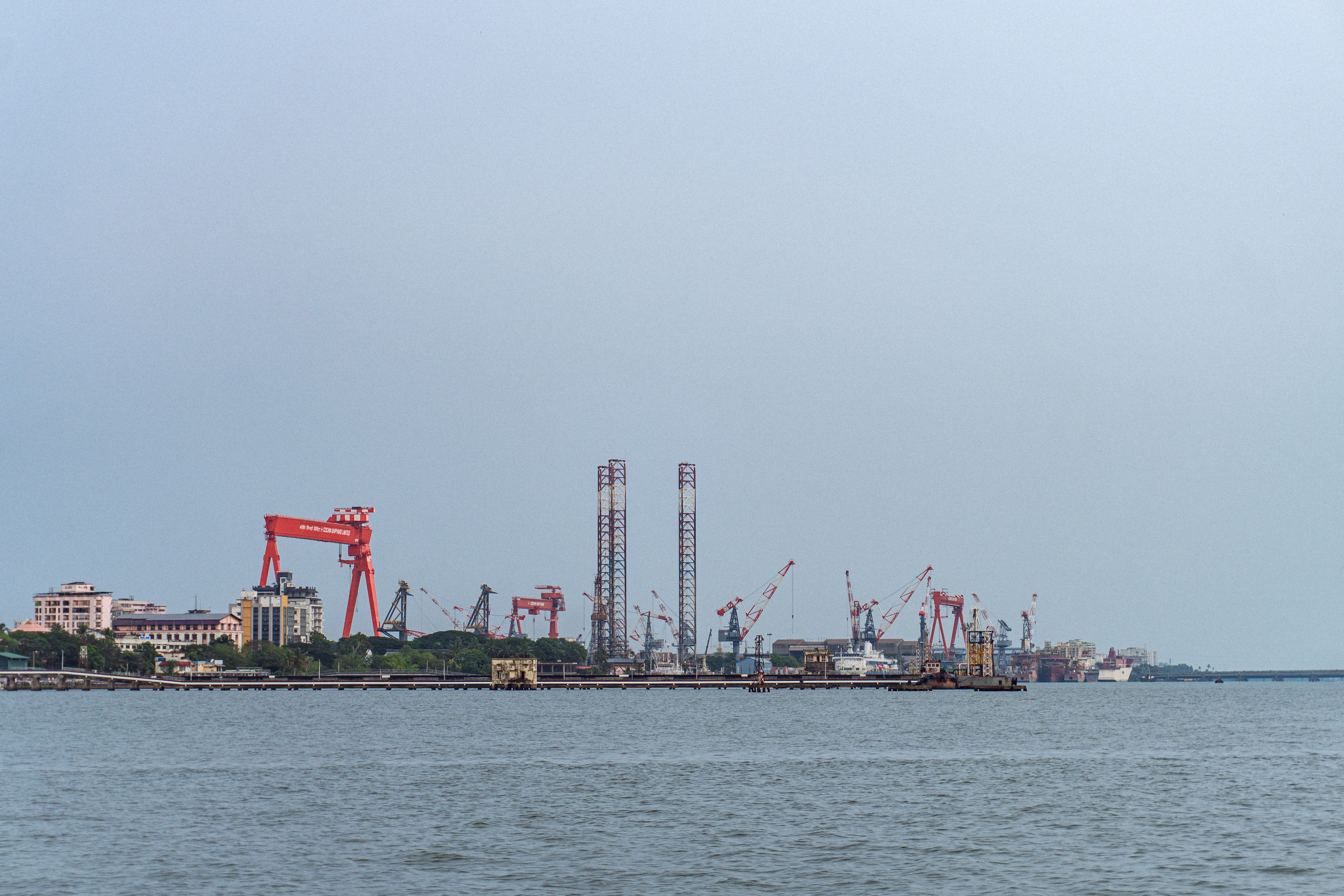 Ferry crossing the harbour to Fort Kochi with the city skyline behind