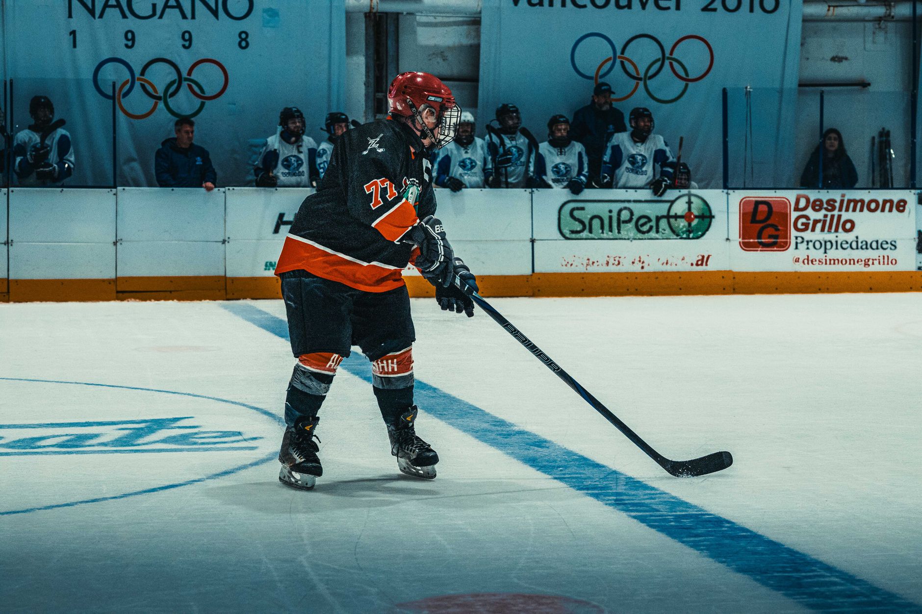 A thrilling moment in an ice hockey match with a player in action, captured in Buenos Aires, Argentina.