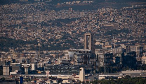 Free Expansive aerial view showcasing the dense urban landscape and architecture of İzmir, Türkiye. Stock Photo