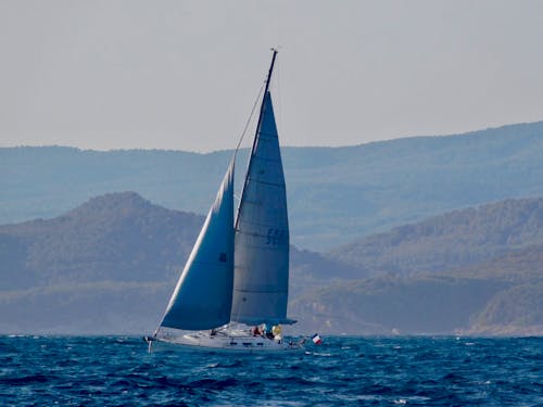 Free White Sailboat On Sea Stock Photo