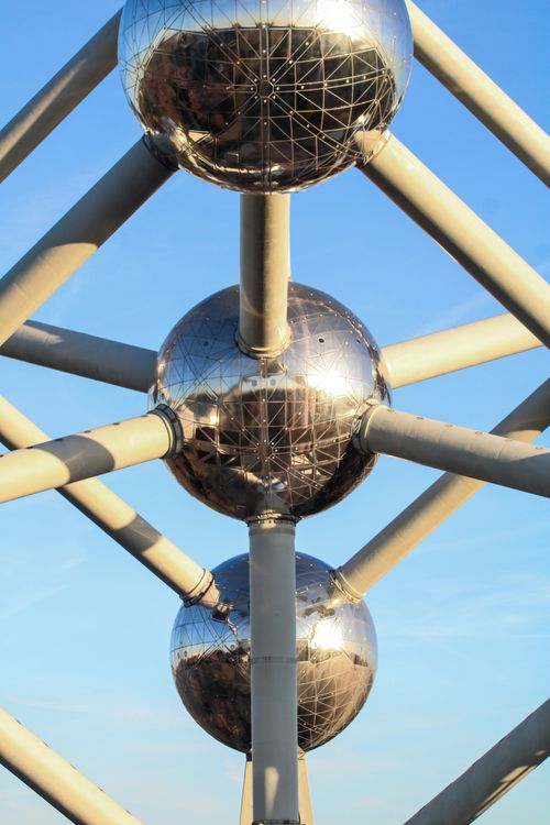 Free Detailed view of the Atomium's shiny spheres and connections under a clear sky in Brussels. Stock Photo