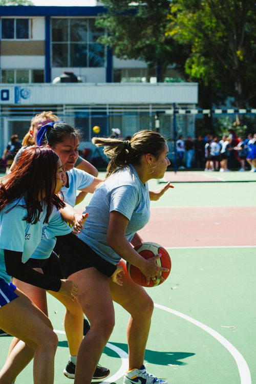 Free A lively basketball game among women on an outdoor court in Mexico City. Stock Photo