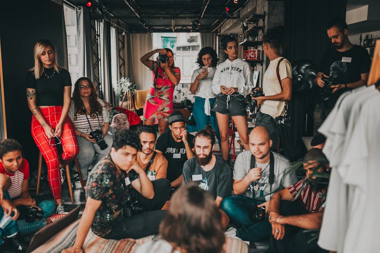 Group Of Diverse People Gathering And Listening To Lecture