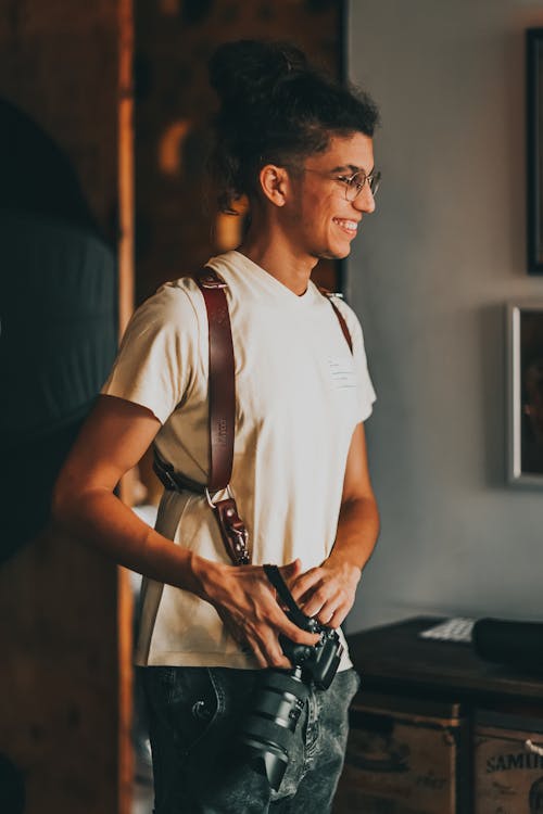 Man In White Crew Neck T-shirt And Black Pants