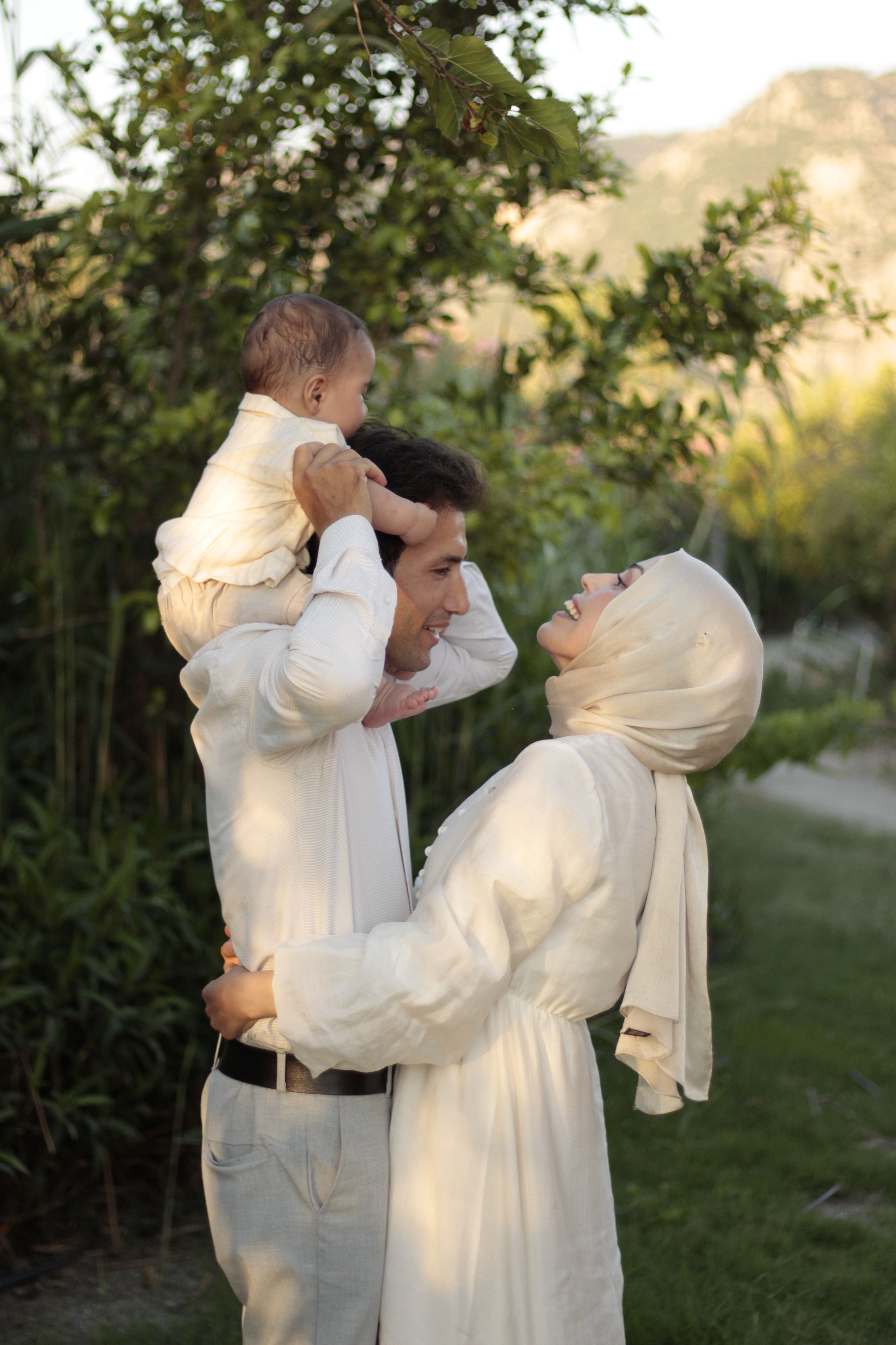 A joyful family spending quality time outdoors in a scenic setting.