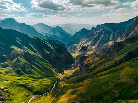 Breathtaking aerial view of lush green mountains and valleys in Hakkari, Türkiye.