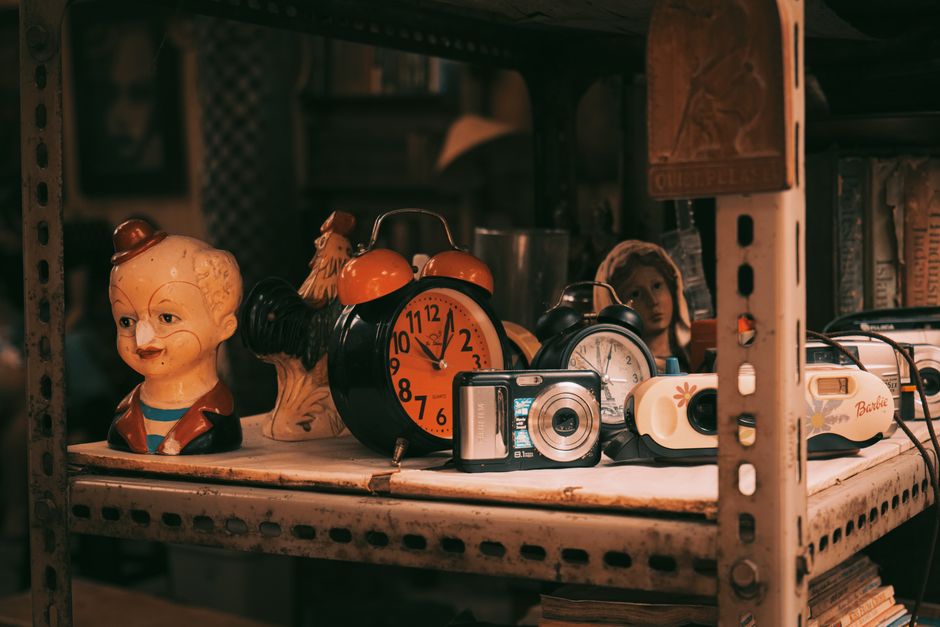 A collection of quirky, artistic home decor items displaying unique shapes and colors