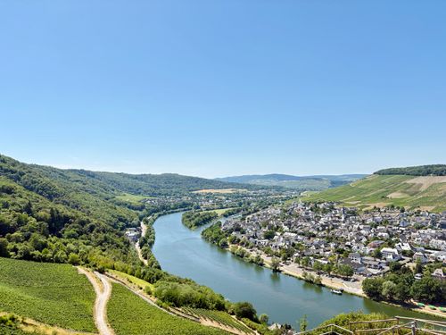 Free Stunning aerial view of Bernkastel-Kues, Germany with the Moselle River and vineyards in summer. Stock Photo