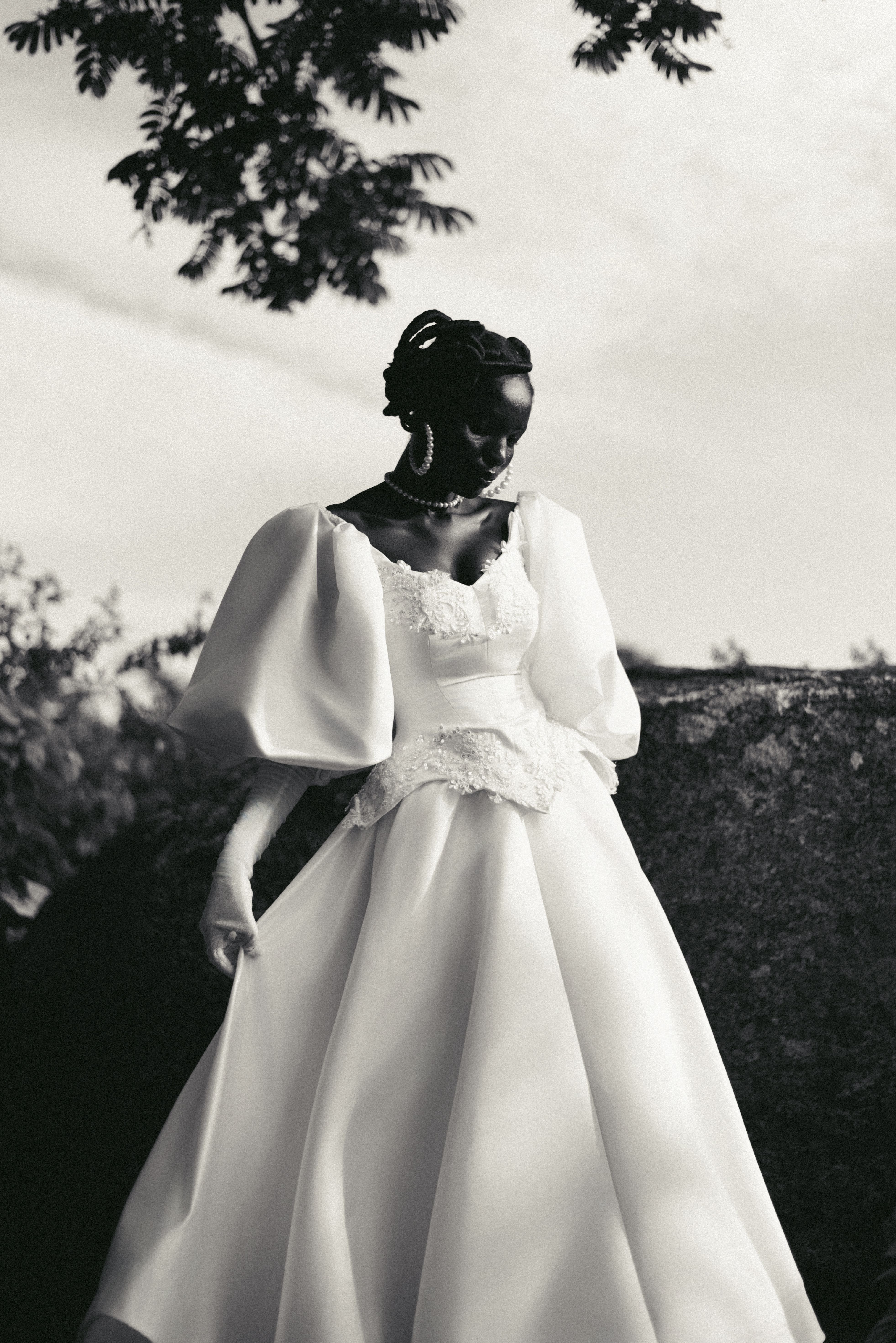 A stunning black and white portrait of an African bride in elegant bridal attire.