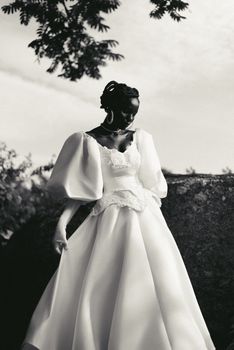 A stunning black and white portrait of an African bride in elegant bridal attire.