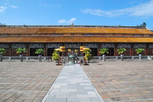 Free Spacious courtyard of a traditional temple in Hue, Vietnam with vibrant architecture. Stock Photo