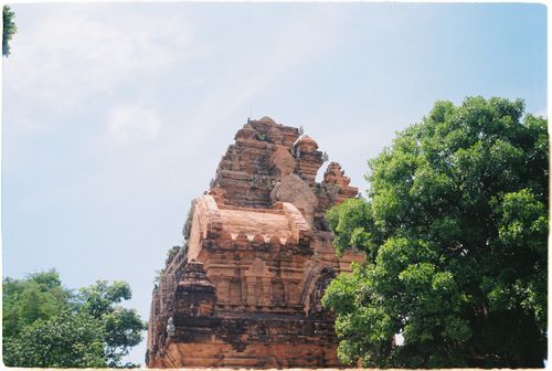 Free Explore the ancient Po Nagar Tower surrounded by lush greenery under a clear blue sky. Stock Photo