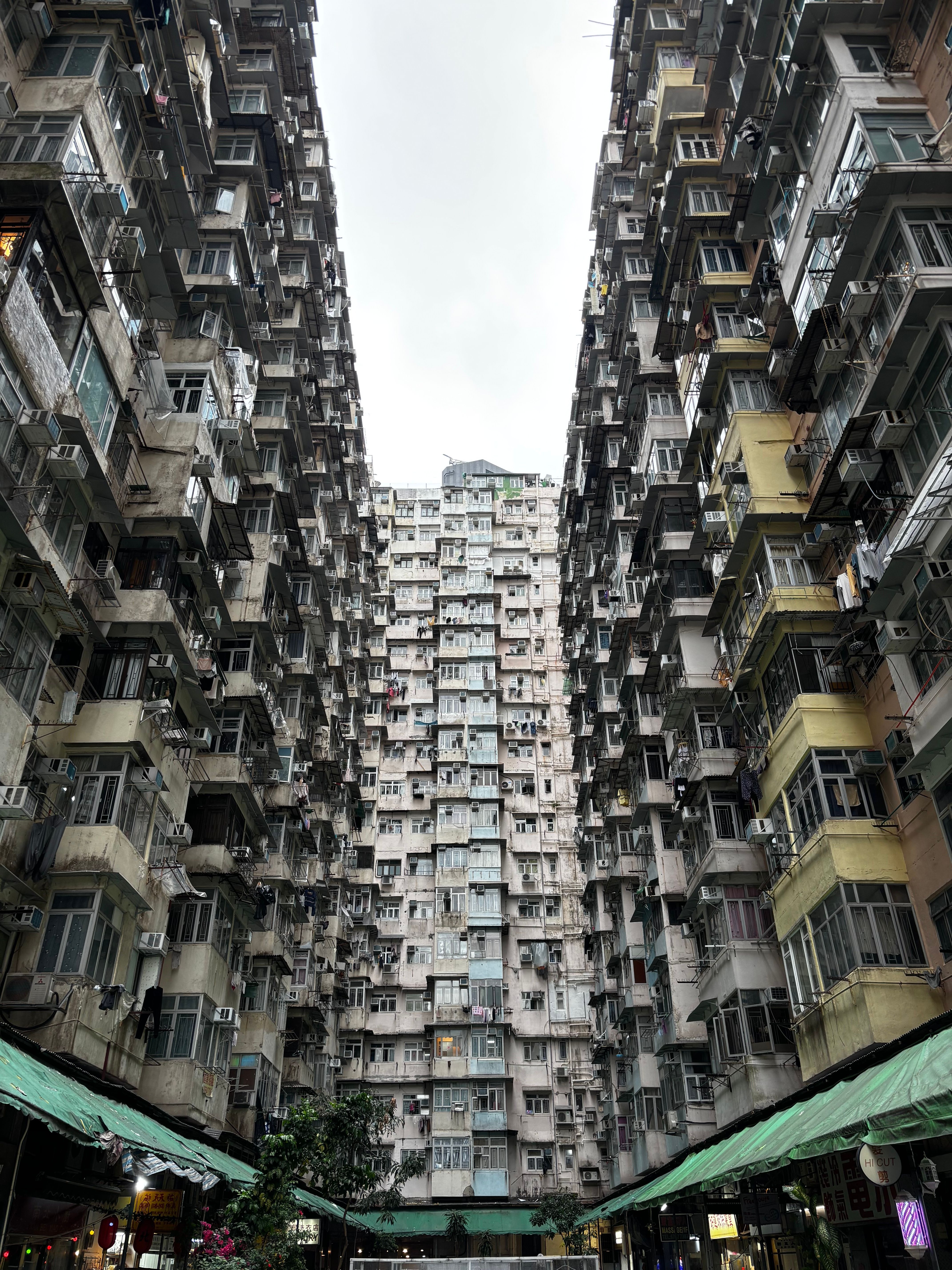 Symmetrical view of high-rise residential towers on Hong Kong Island