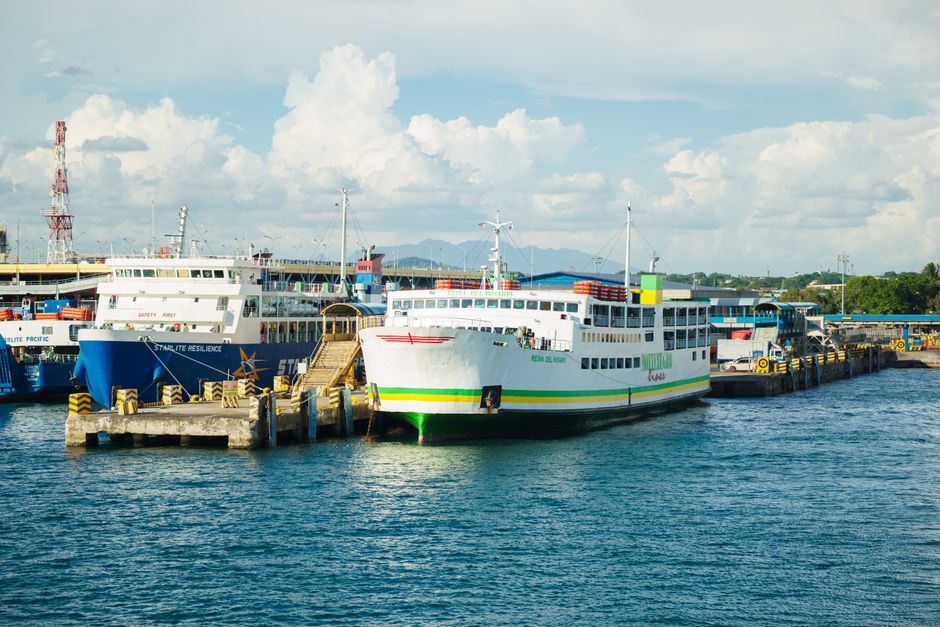 Fast ferry arriving at a tropical island port in the Philippines