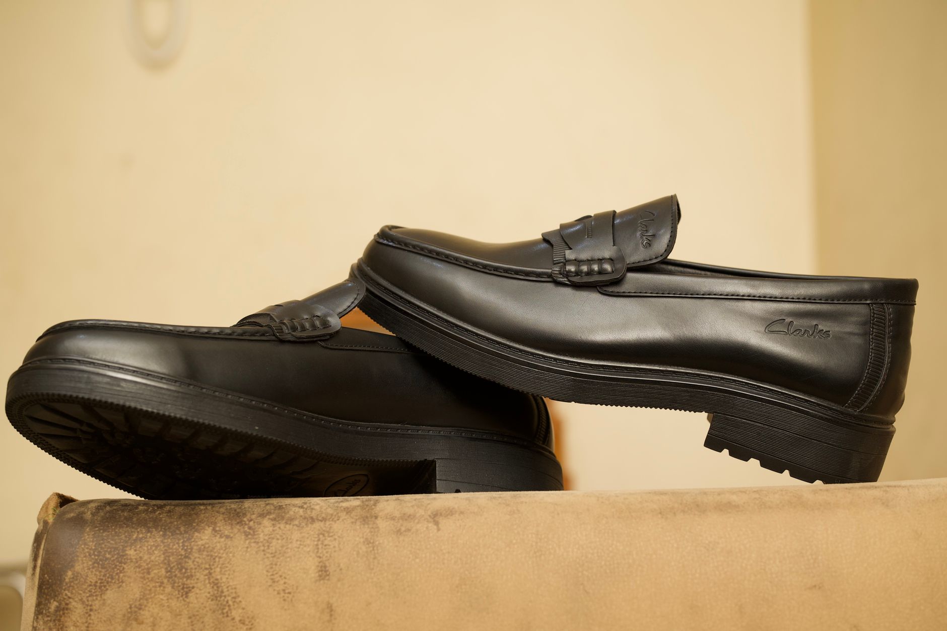High-quality black leather loafers with a sleek design, perfect for formal and smart casual wear.