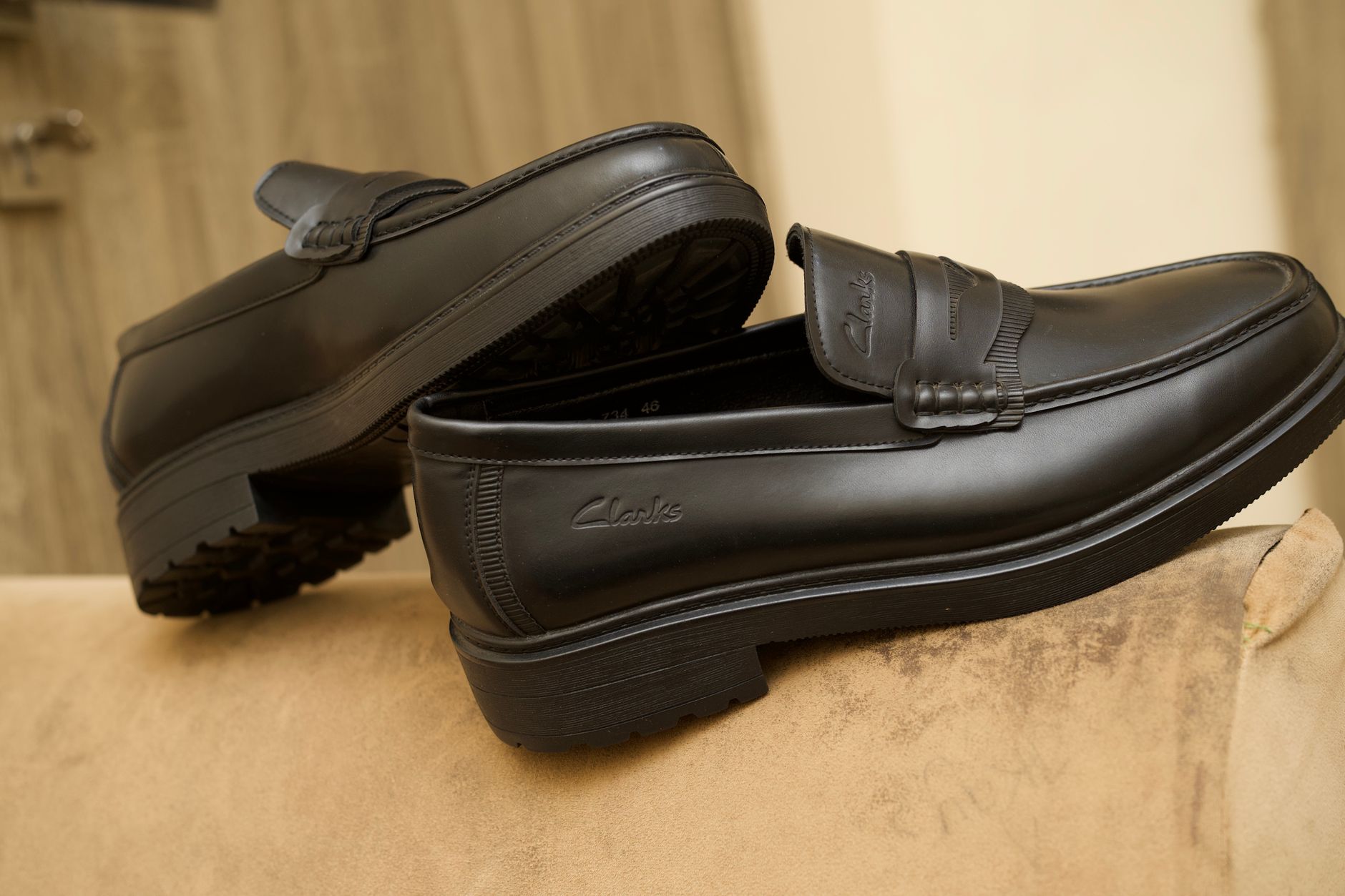 Premium black leather loafers by Clarks, showcasing style and elegance for smart casual and formal occasions.