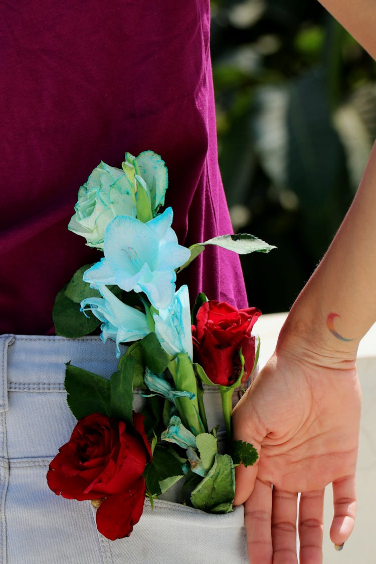 Flowers On A Person's Back Pocket