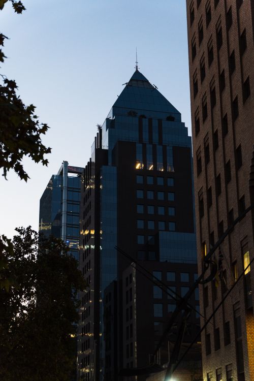 Free Modern skyscrapers in Santiago, Chile at twilight, showcasing urban architecture. Stock Photo