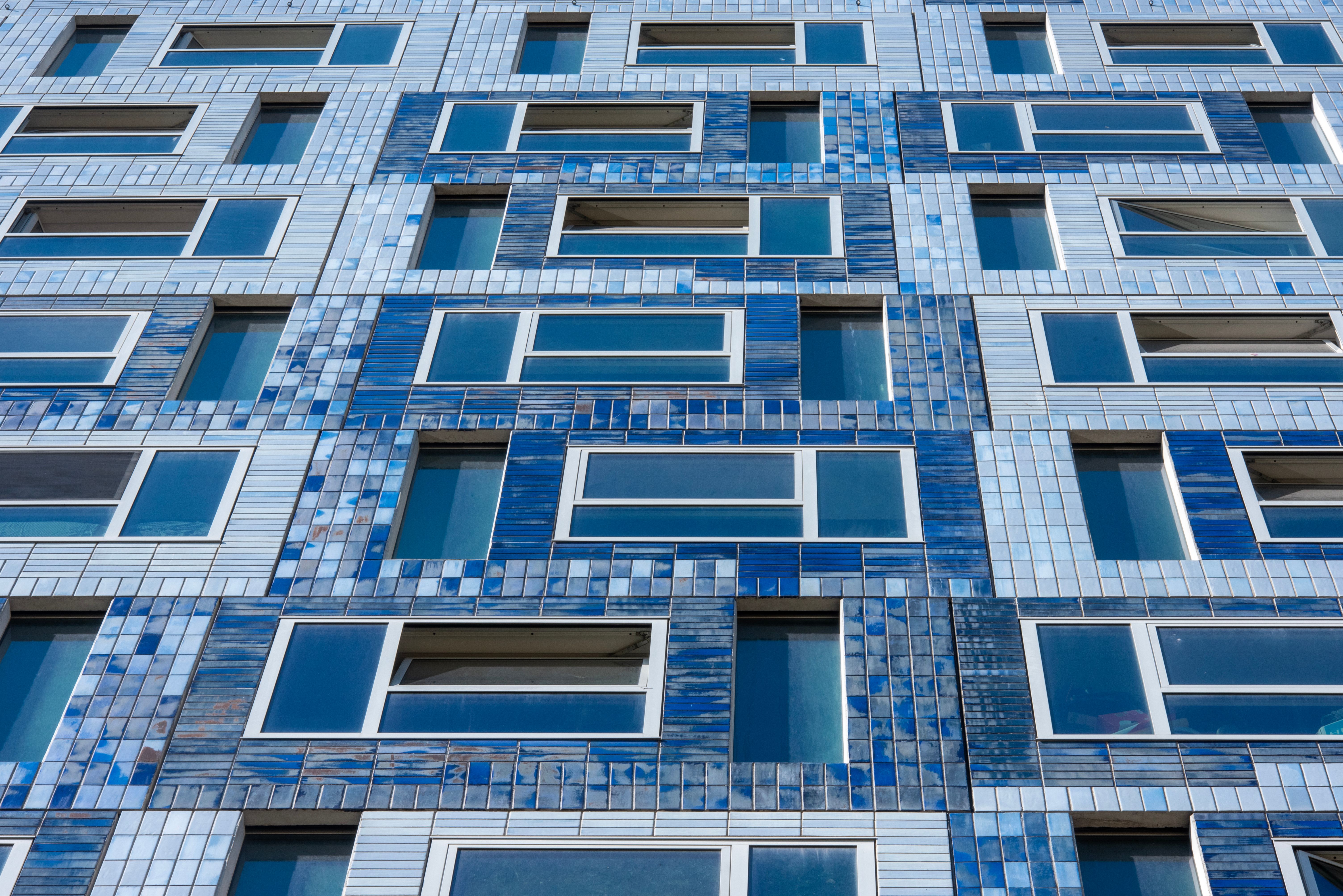 Exterior Painting in Holborn — a decorator at work mid-project