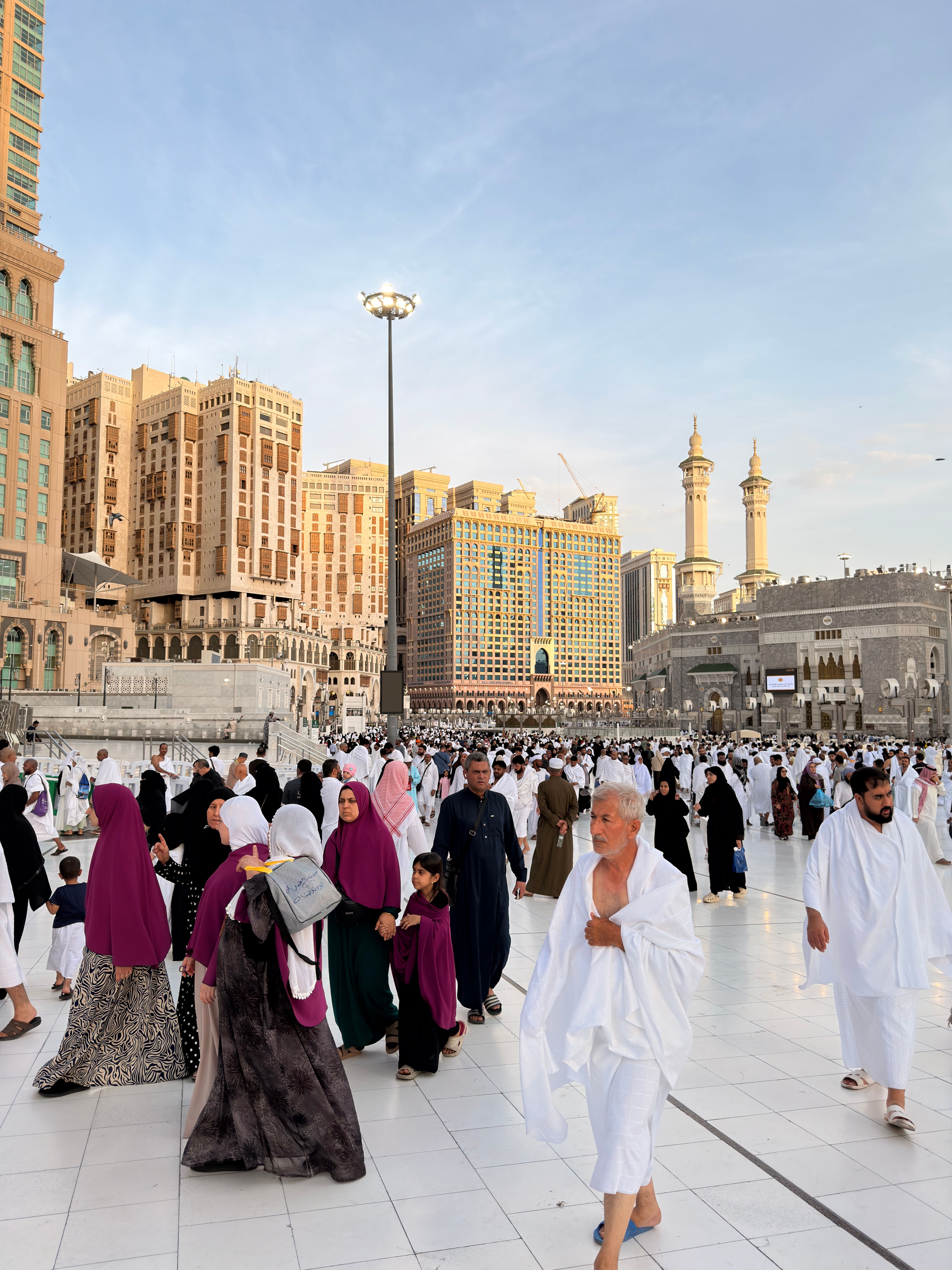 Muslim pilgrims gathering near Masjid al-Haram in Makkah