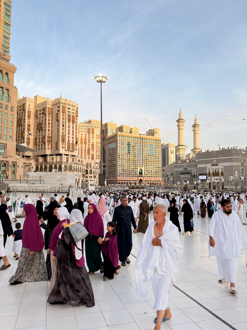 Muslim pilgrims gathering near Masjid al-Haram in Makkah