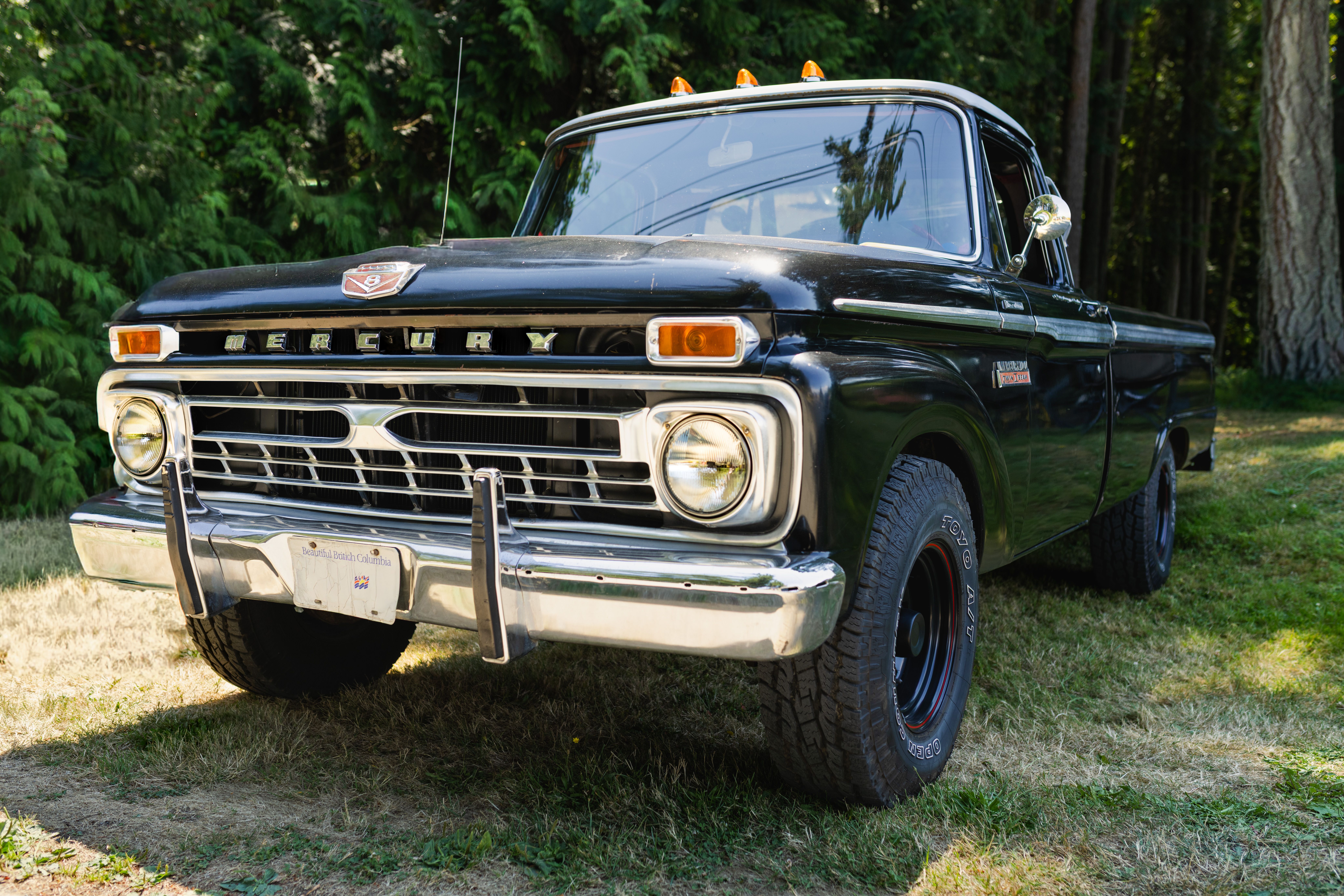 Vintage Mercury truck displayed outdoors in Victoria, showcasing classic automotive design.