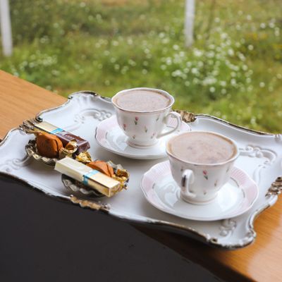 Vintage tray with two cups of cocoa — photo by Gizem Gokce on Pexels