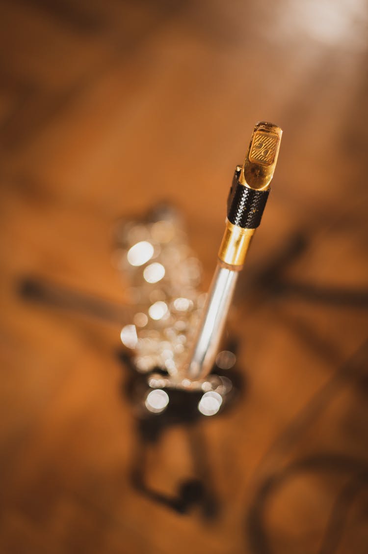 Brass Saxophone Mouthpiece In Close-up Photography