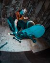 A Skater Midair Grabbing His Skateboard