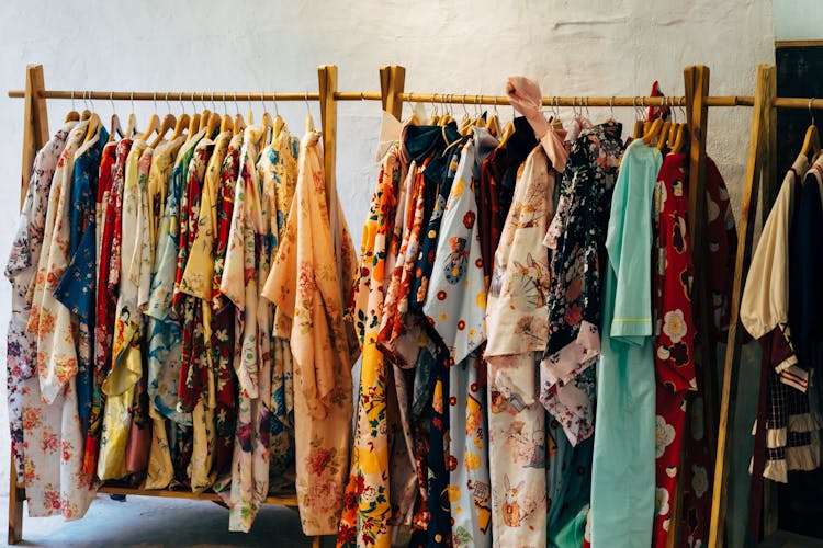 Assorted Colorful Clothes On Rack