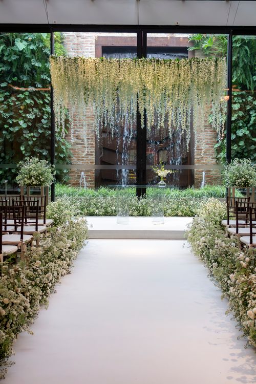 Free Beautiful wedding altar with white flowers and greenery in São Paulo, Brazil. Stock Photo