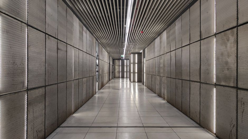 Modern interior of a Tbilisi Metro station in Georgia with escalators