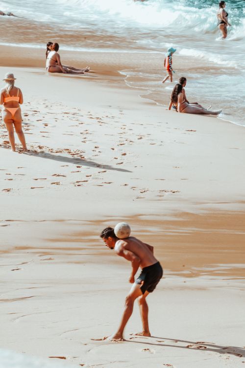 Free People enjoying summer activities on Copacabana Beach in Rio de Janeiro. Stock Photo