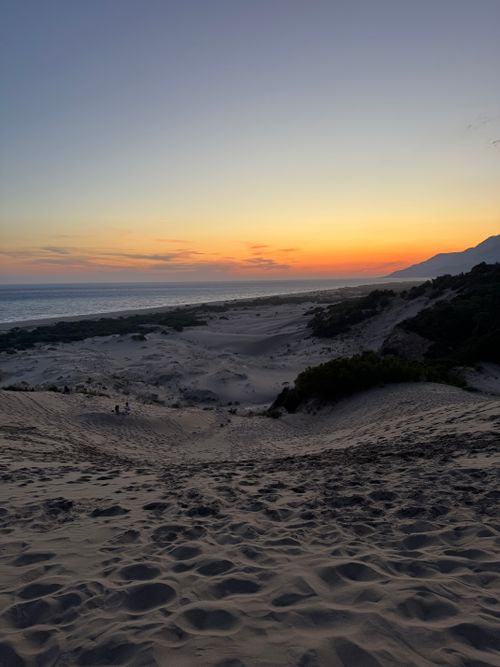 Free Enjoy the serene sunset over the dunes of Patara Beach, Turkey, offering a stunning coastal view. Stock Photo