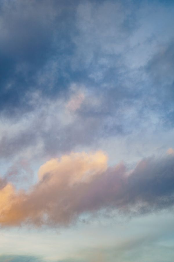 Pastel cloud bank at dusk — photo by Nothing Ahead on Pexels