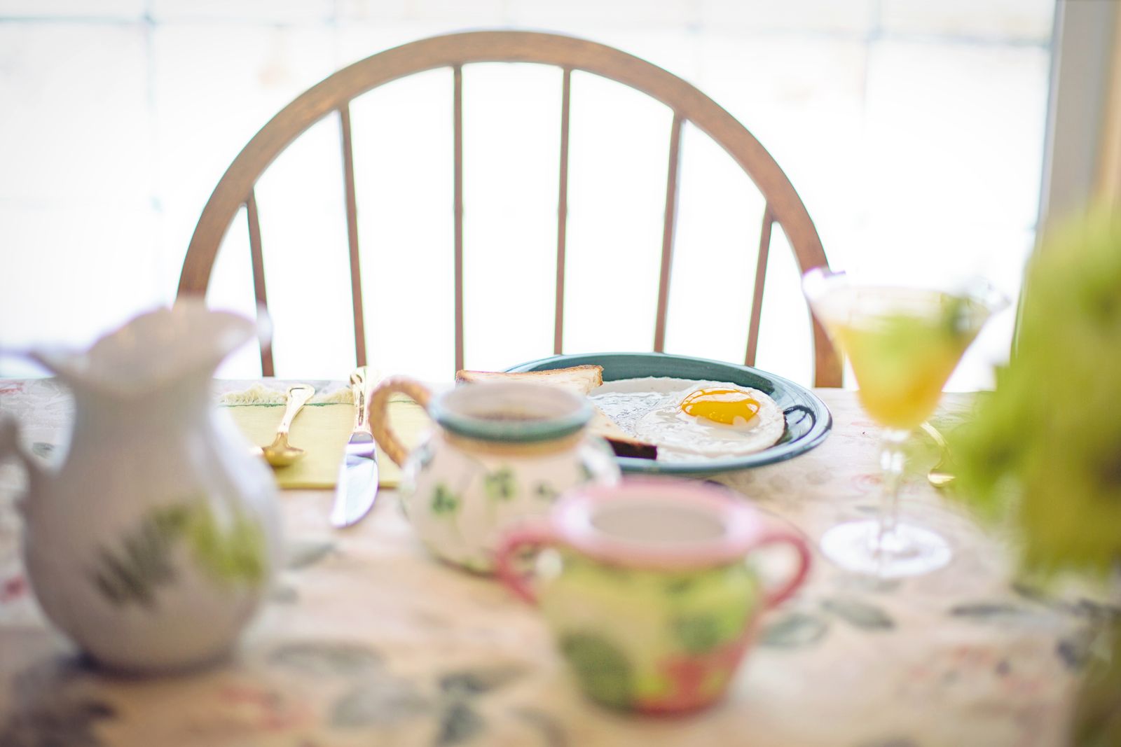 Breakfast of eggs, toast, and tea