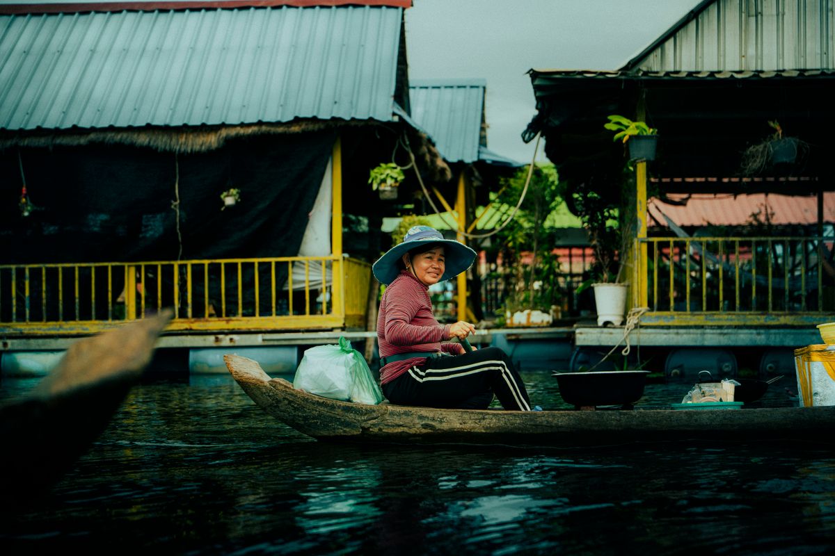 Paddling home, Floating village, Tonle Sap, Cambodia