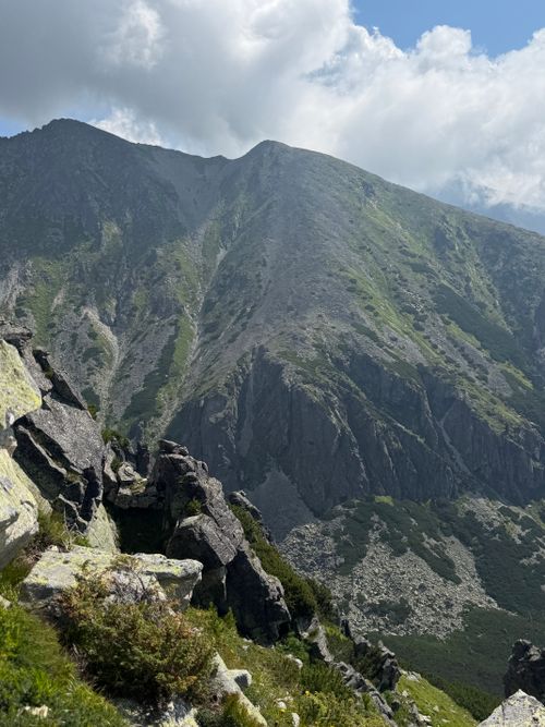 Free Dramatic view of the High Tatras mountains under a cloudy sky during summer. Stock Photo