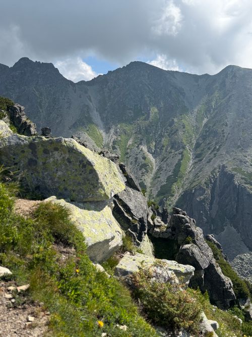 Free Beautiful rocky landscape in the High Tatras, showcasing summer greenery and dramatic peaks. Stock Photo