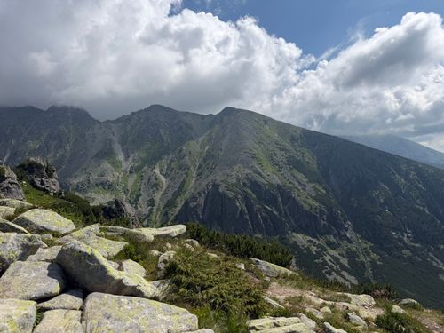 Free Captivating view of the Tatra Mountains with clouds casting shadows over rocky peaks. Stock Photo