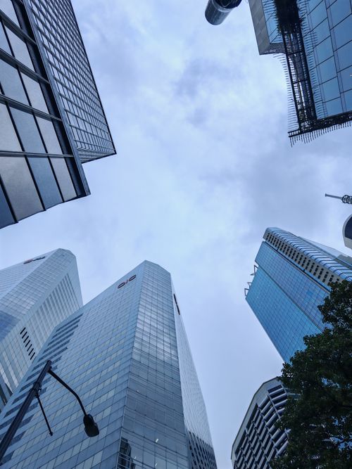 Free Upward view of modern skyscrapers in Brisbane, Australia, on a cloudy day. Stock Photo