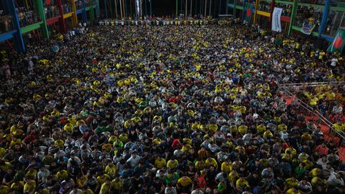 Free A vibrant gathering of diverse people at an indoor event in Dhaka, Bangladesh. Stock Photo